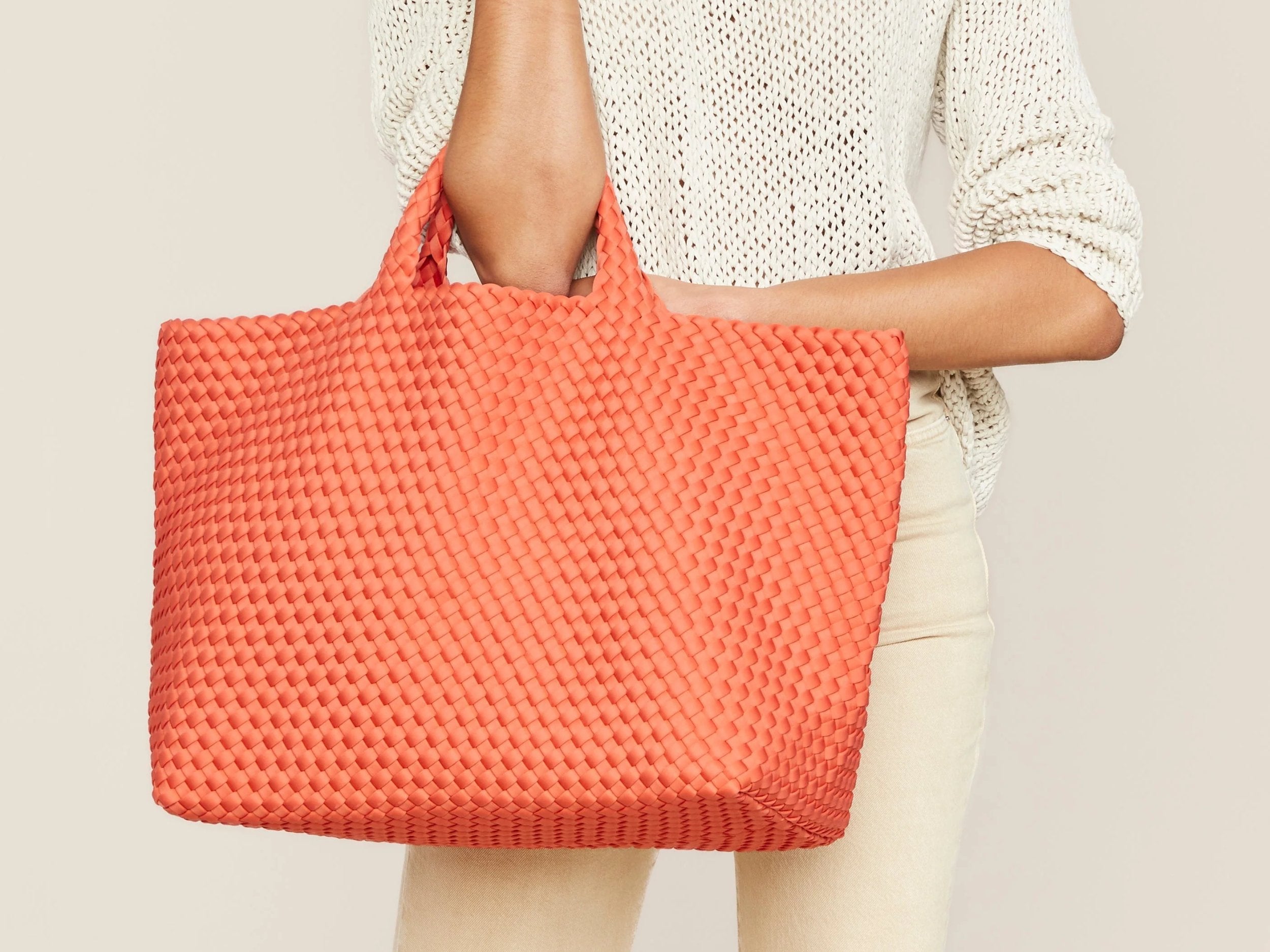 Naghedi at Marina St. Barth – handwoven neoprene bags combining utility, color, and modern chic