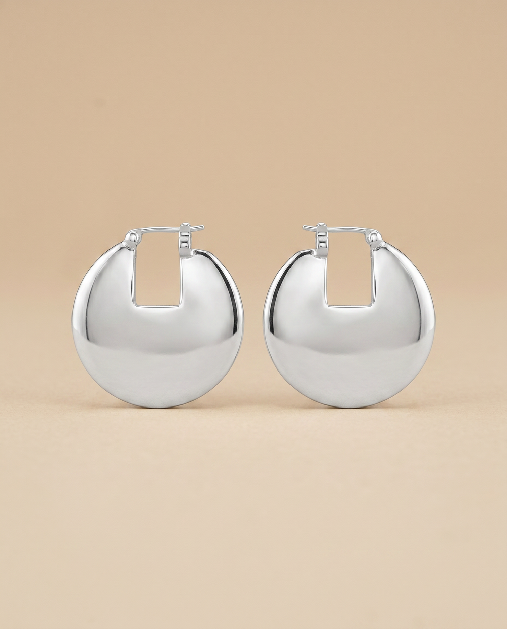 Tay Small disc earrings Silver by Tay from Marina St Barth